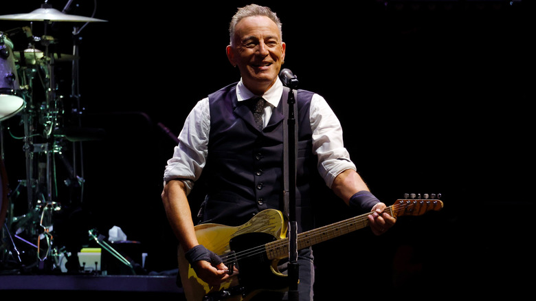 Bruce Springsteen performing on stage