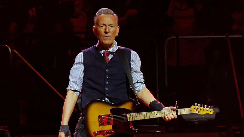 Bruce Springsteen standing on stage