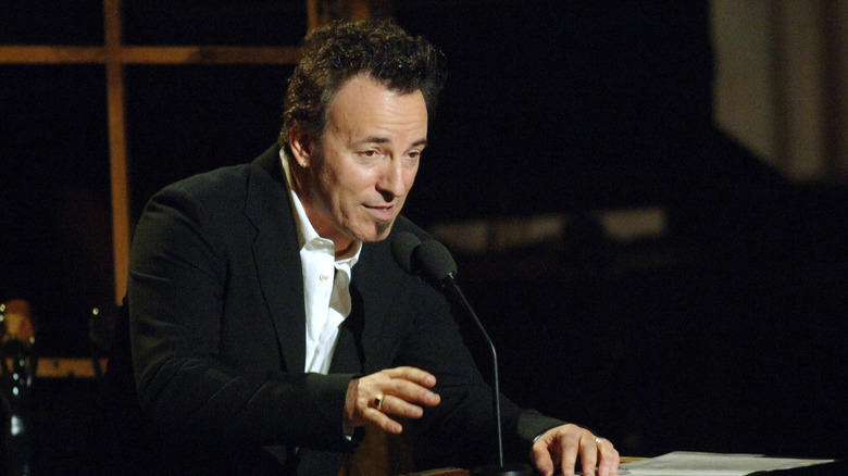Bruce Springsteen speaking at podium