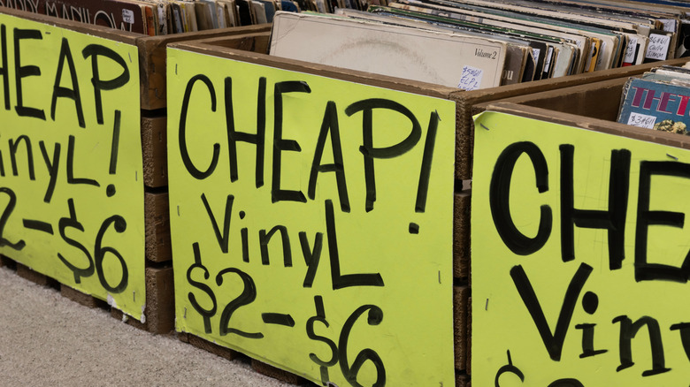 boxes of records marked "cheap vinyl"