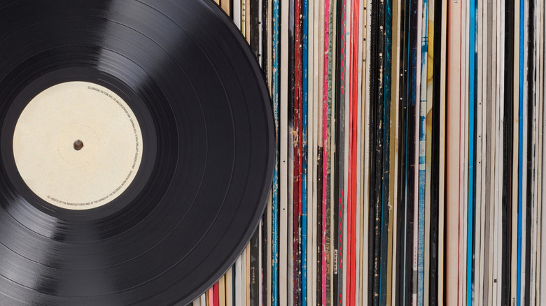 Vinyl records in a row with one in front
