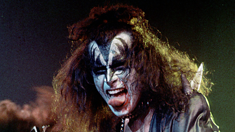 Gene Simmons of Kiss sticking tongue out on stage