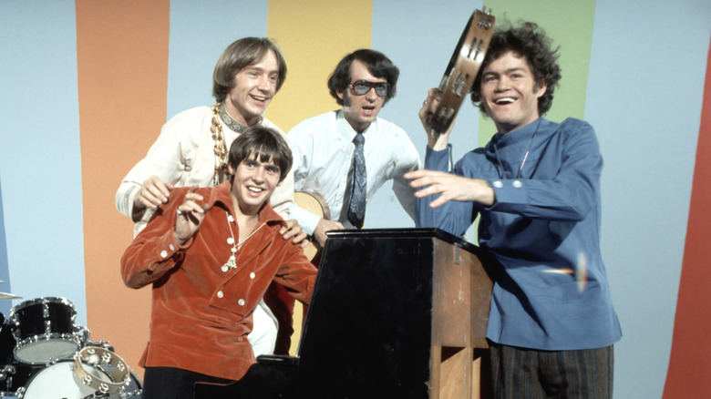 the Monkees laughing by piano