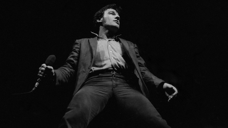 Bruce Springsteen performing on stage
