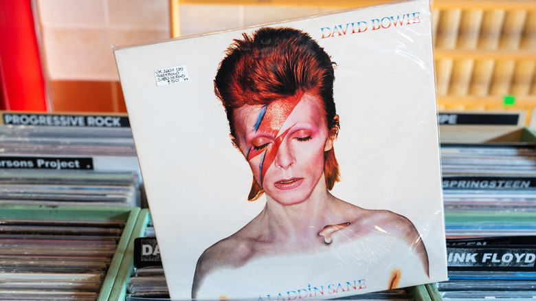 David Bowie Aladdin Sane album pulled out of crate in record store