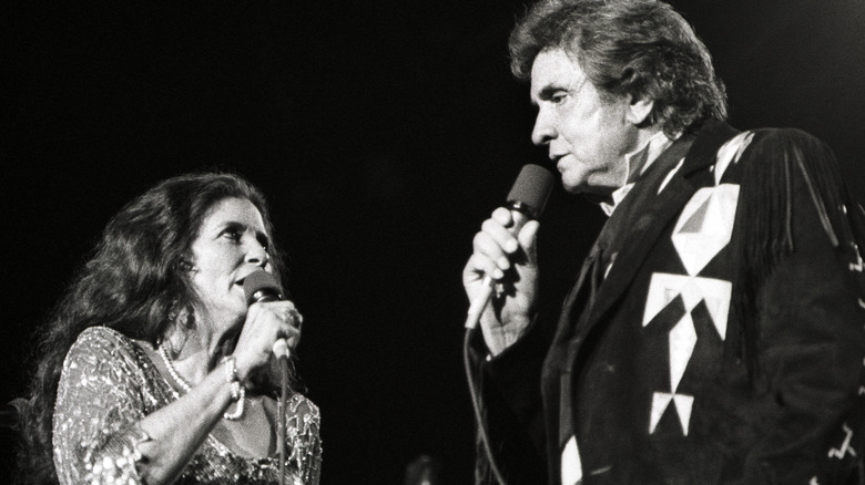 Johnny Cash and June Carter singing together
