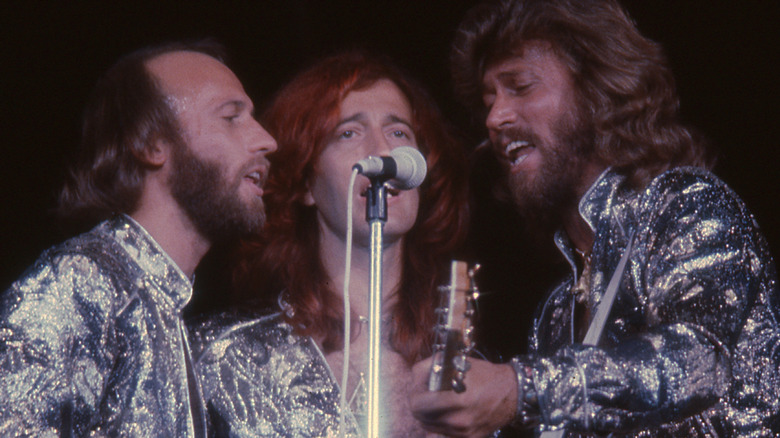 The Bee Gees performing onstage