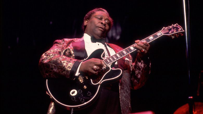 B. B. King playing Lucille on stage
