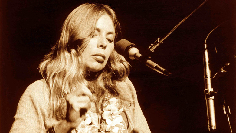 Joni Mitchell performs in 1974