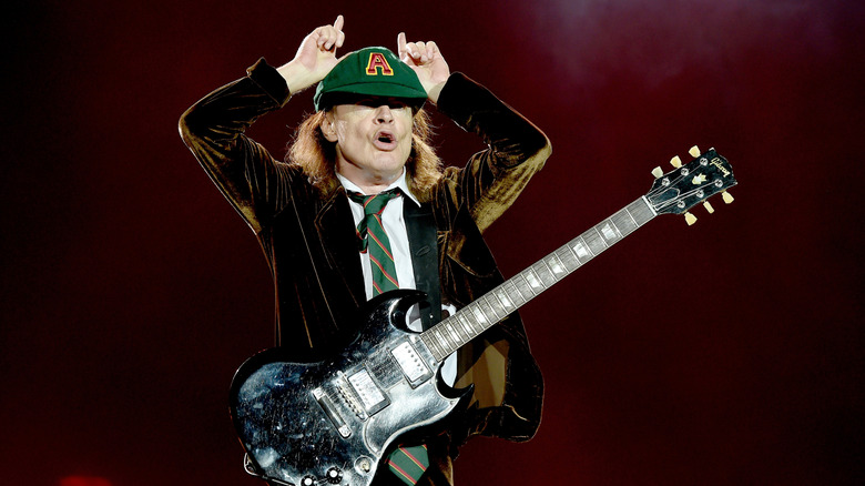 AC/DC's Angus Young making devil horns
