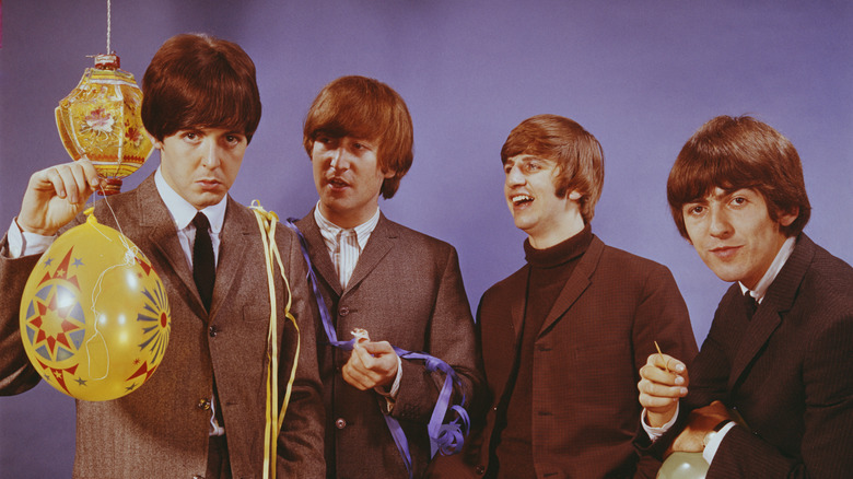 The Beatles pose in 1964