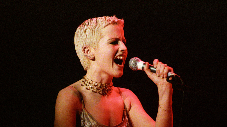 Dolores O'Riordan performing on stage