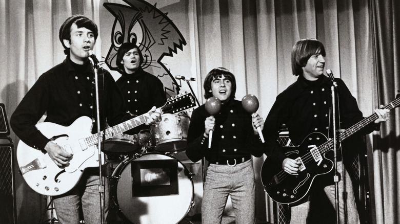 The Monkees singing and performing