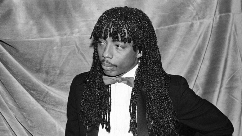 Rick James holding an award in 1982