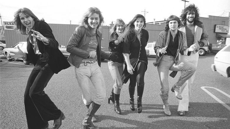 members of Heart dancing in a parking lot in 1978