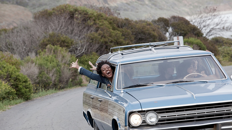 teens riding together in a car in the 1970s