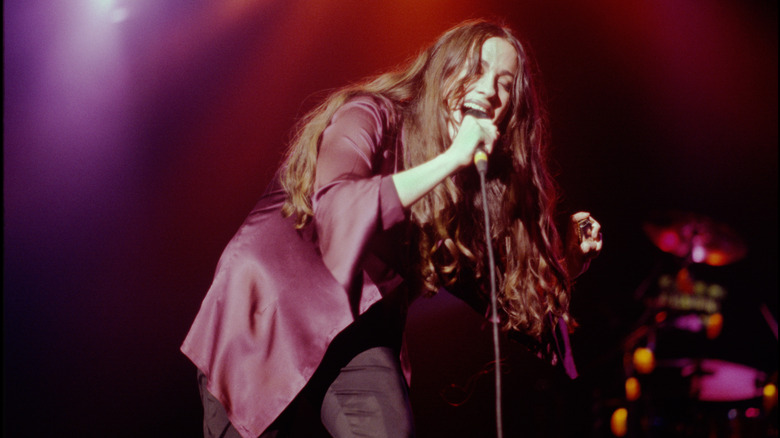Alanis Morissette performing in concert