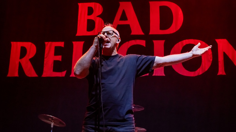Greg Graffin onstage in front of Bad Religion backdrop