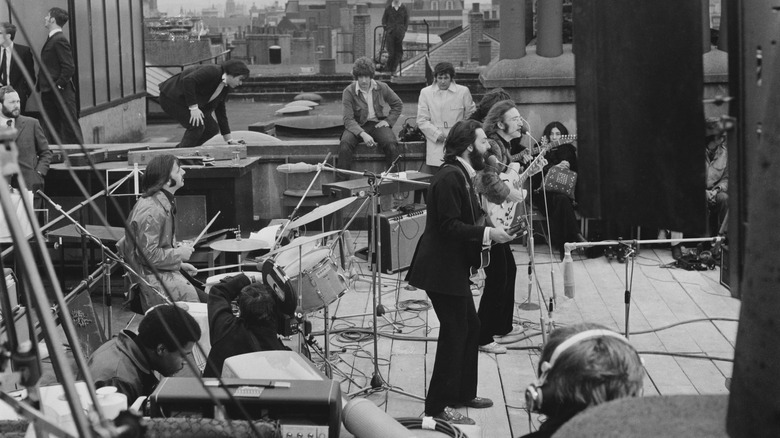 The Beatles performing on a rooftop in 1969