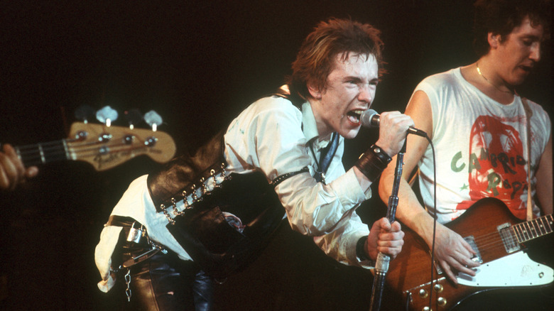 Johnny Rotten and Steve Jones of Sex Pistols on stage