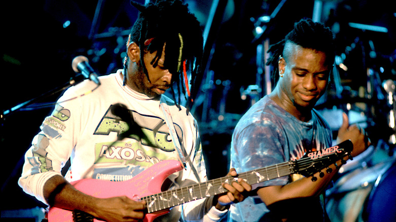 Living Colour's Vernon Reid and Corey Glover playing on stage in 1990