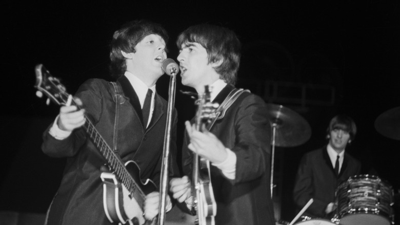 Three of the Beatles on stage in the 1970s