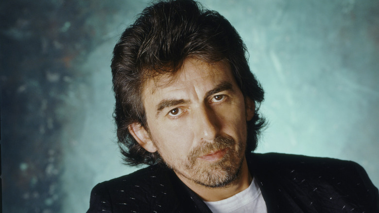 George Harrison posing for studio portrait