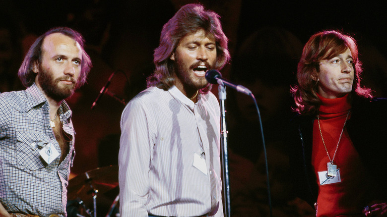 The Bee Gees performing onstage in 1979