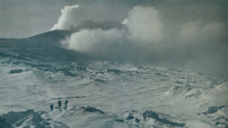 Antarctic explorers at polar volcano