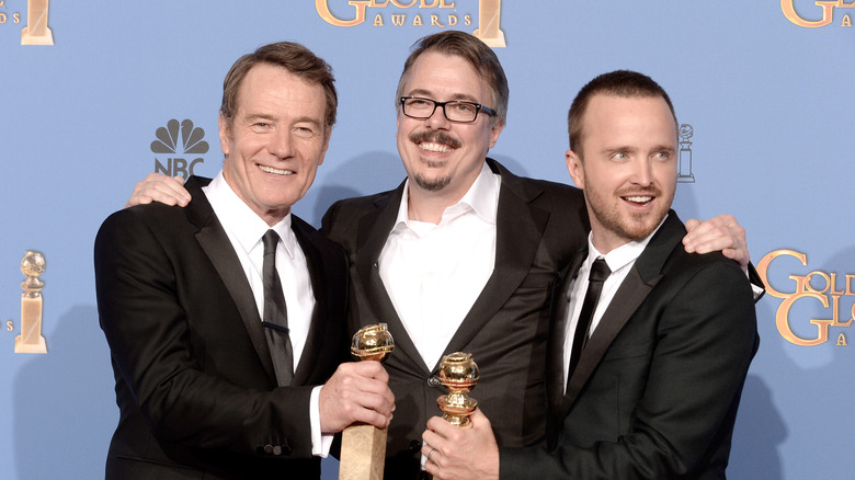 Brian Cranston, Vince Gilligan, and Aaron Paul at Golden Globes with statuettes