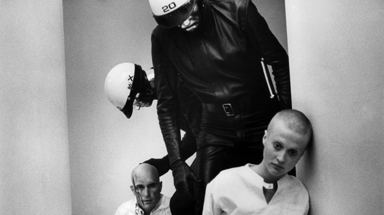 THX-1138 robot police arrest scene