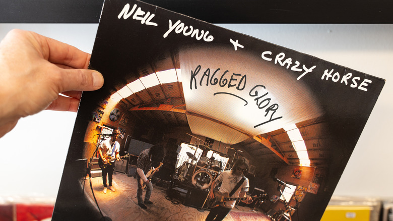 Hand holding "Ragged Glory" LP