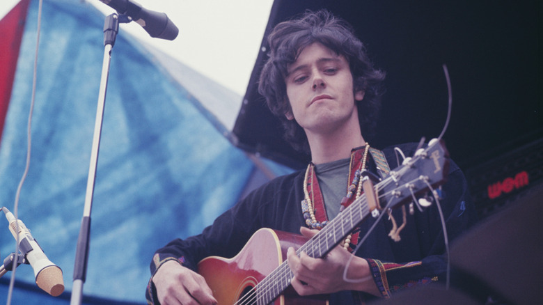 Donovan playing at festival