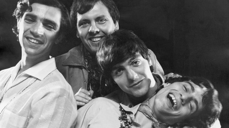 The Young Rascals posing for pic smiling