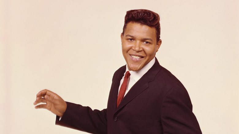 Chubby Checker grinning and dancing in publicity photo
