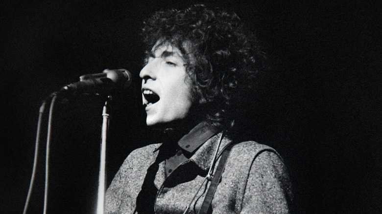 Bob Dylan singing onstage in the 1960s