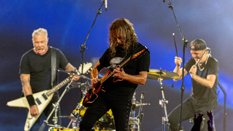 Metallica playing on stage during live concert