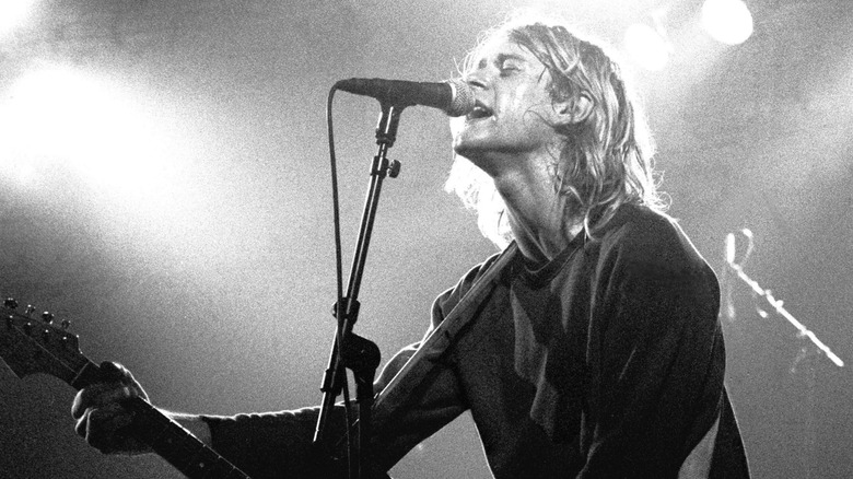 Curt Cobain singing on stage
