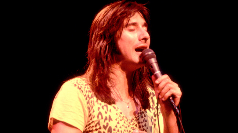 Steve Perry of Journey singing onstage in the early 1980s