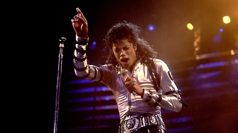 Michael Jackson on stage with microphone