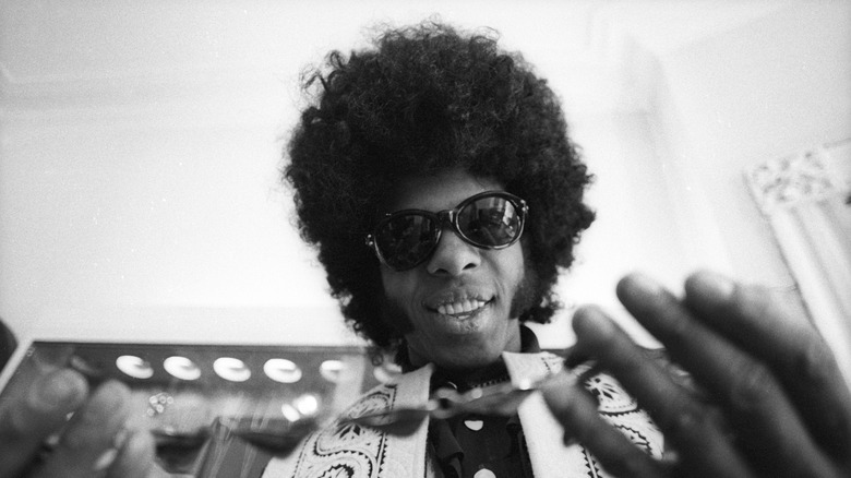 Sly Stone in sunglasses