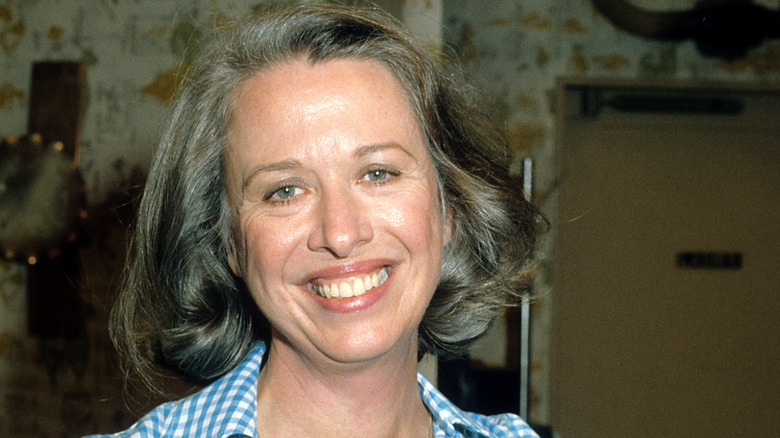 Polly Holiday smiling in 1980s publicity photo