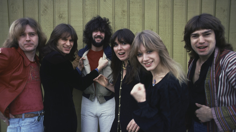 Heart goofing around by a fence in the 1970s