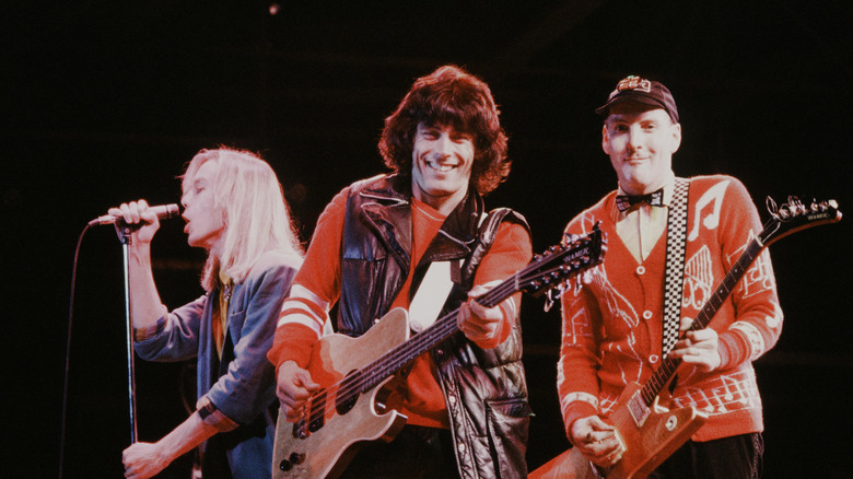 Cheap Trick smiling onstage in late 1970s