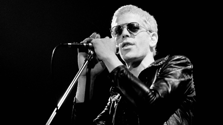 Lou Reed performing onstage in the 1970s