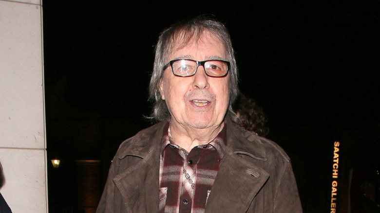 Bill Wyman in glasses with mouth open
