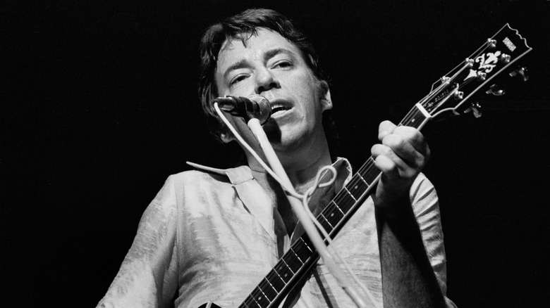 Boz Scaggs onstage with guitar