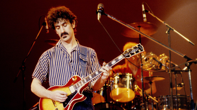 Frank Zappa onstage with guitar