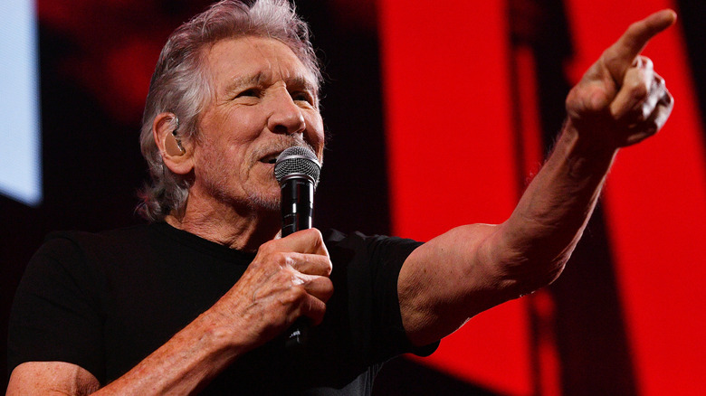 Roger Waters onstage with microphone