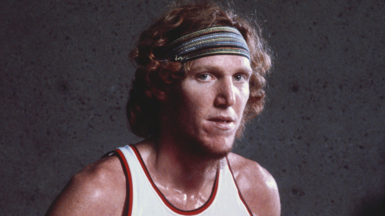 Bill Walton posing for photo in Portland jersey